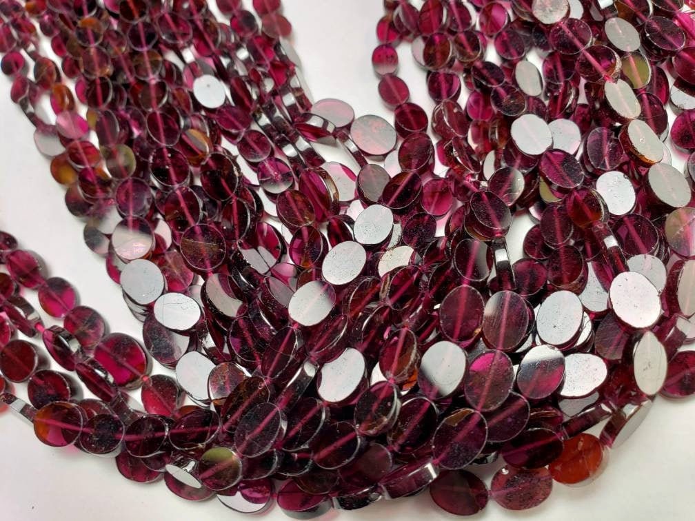 Mozambique Garnet flat Oval 8-9mm beads 14” full strand . Single or bulk close out price