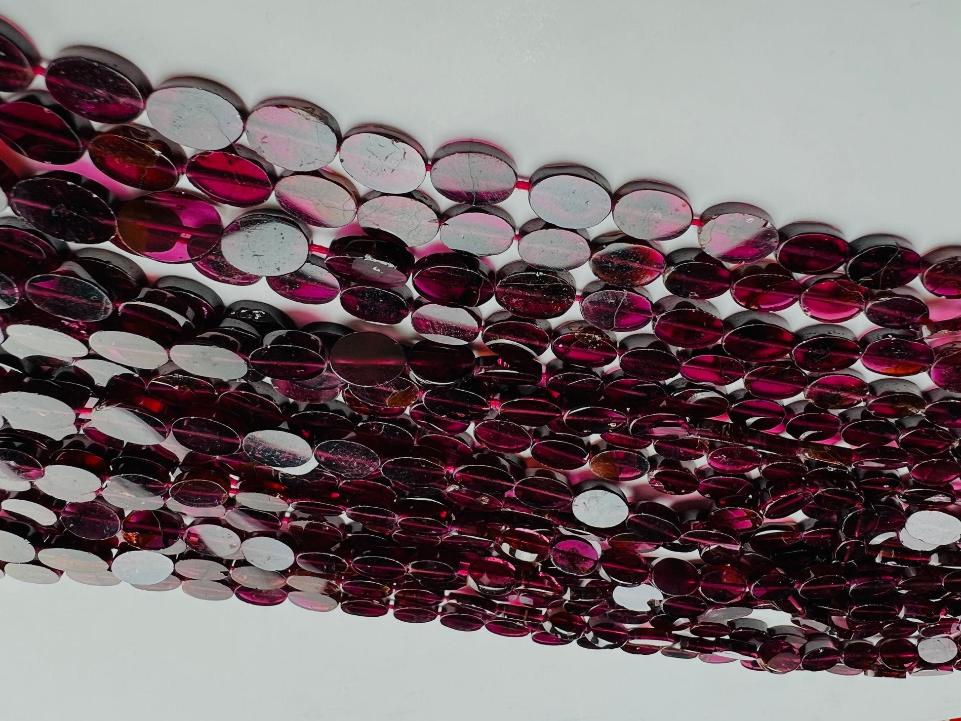 Mozambique Garnet flat Oval 8-9mm beads 14” full strand . Single or bulk close out price