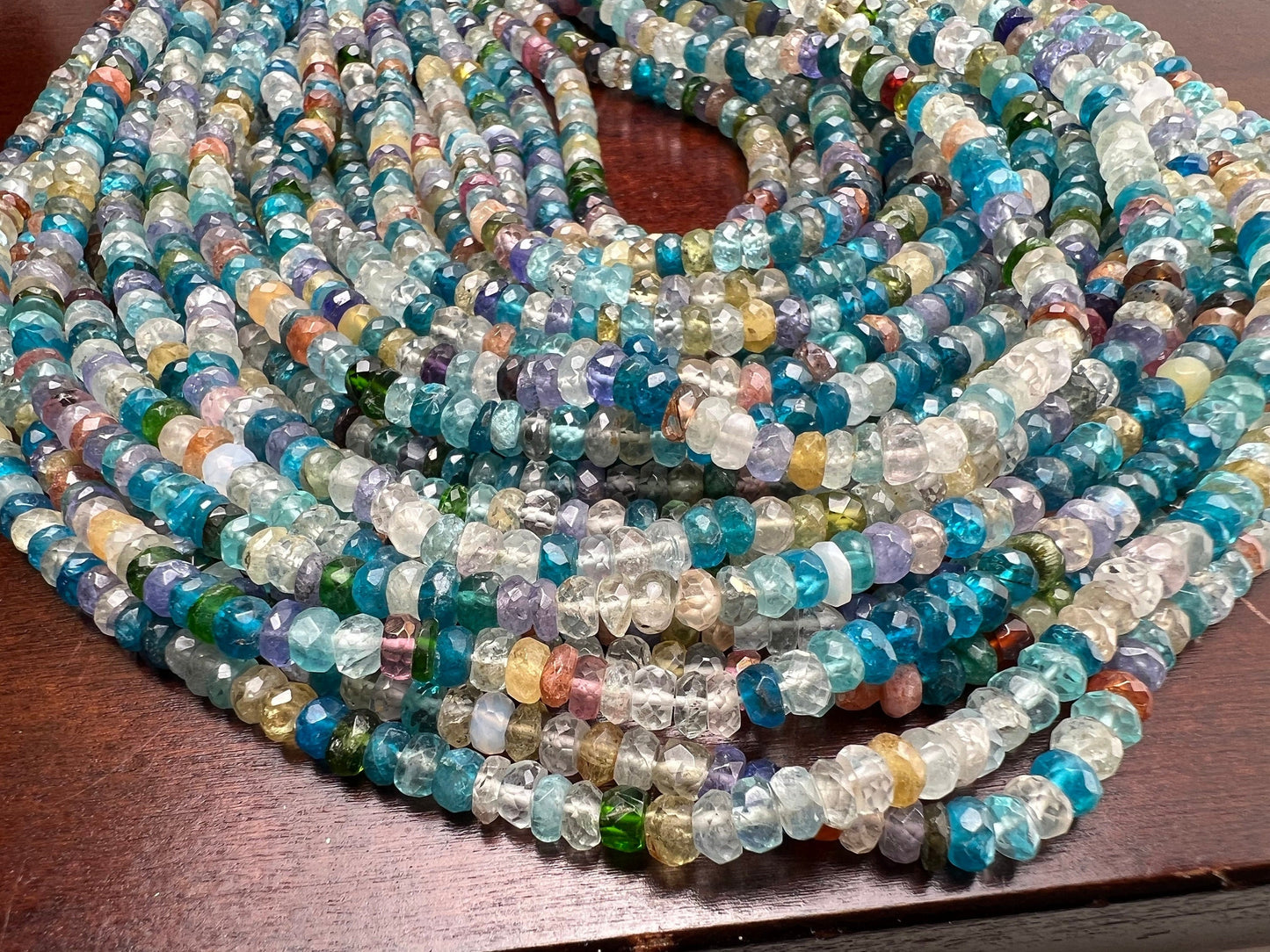 Natural Multi Gemstone Blue shaded 4-5mm roundel mix gems,Apatite aquamarine Moonstone sunshine gems .Beautiful ocean blue beads . 12.5” st