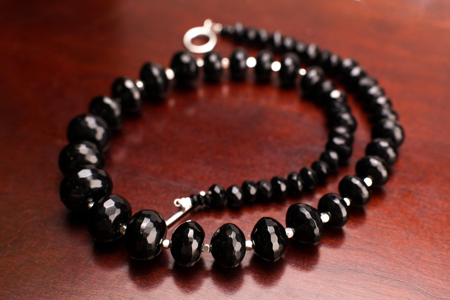 Black Onyx Faceted Graduated Rondelle 7-17mm with Silver Bali Style Spacers And toggle clasp 18" Necklace