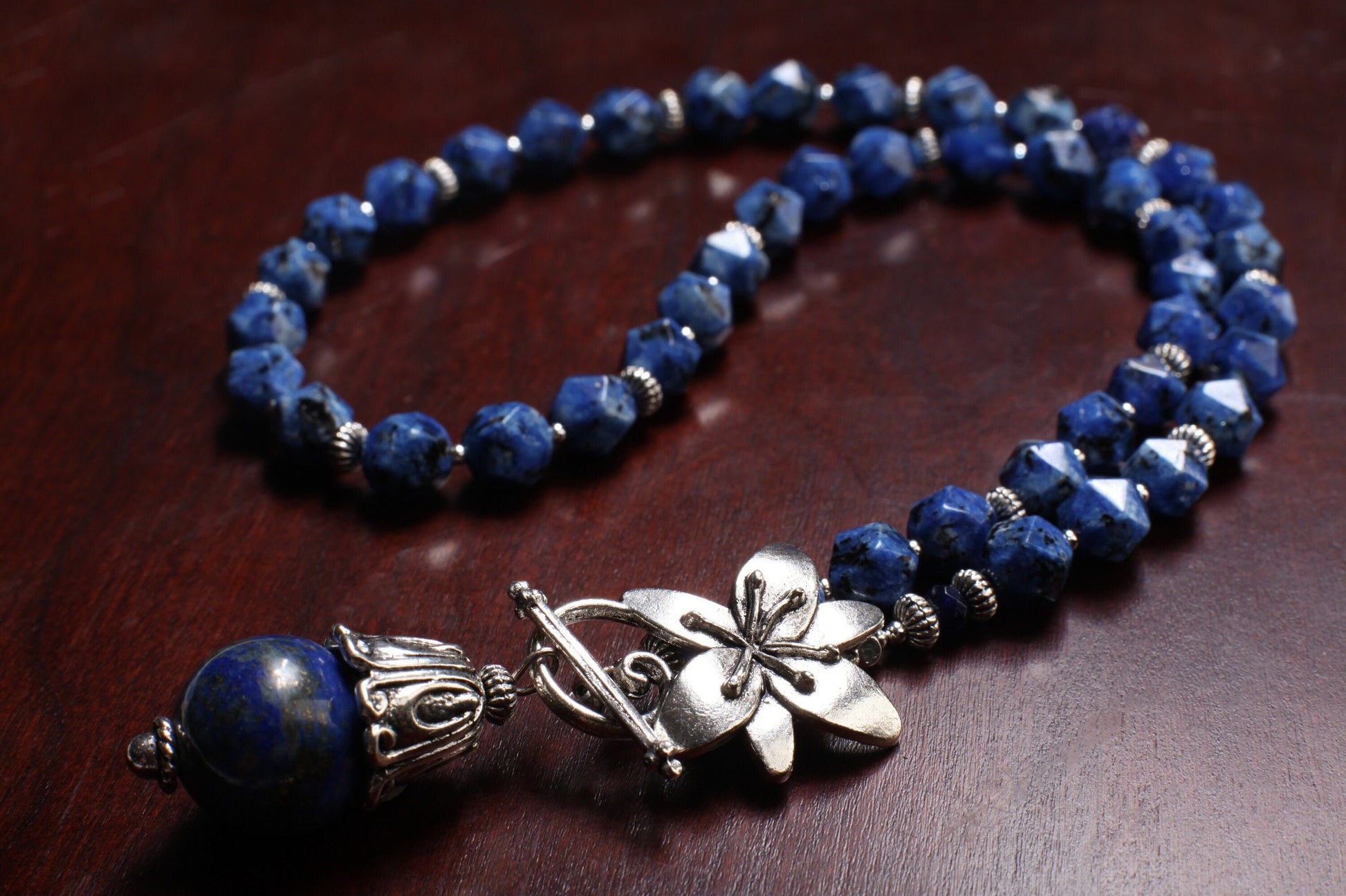 Lapis Lazuli Fancy Cap Pendant with Sodalite Faceted Hexagon Necklace Accented with Bali Style bead and Flower Toggle necklace