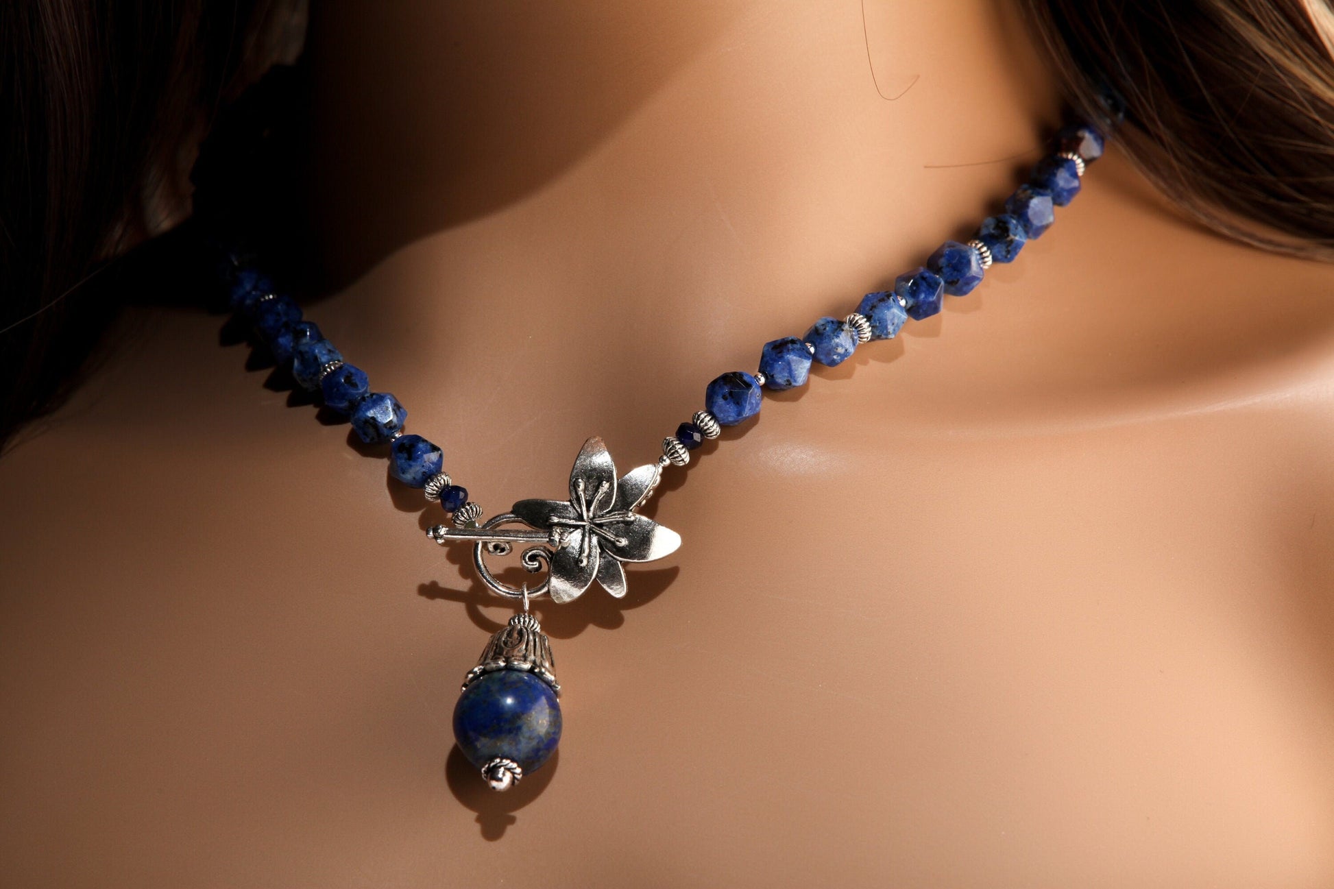 Lapis Lazuli Fancy Cap Pendant with Sodalite Faceted Hexagon Necklace Accented with Bali Style bead and Flower Toggle necklace