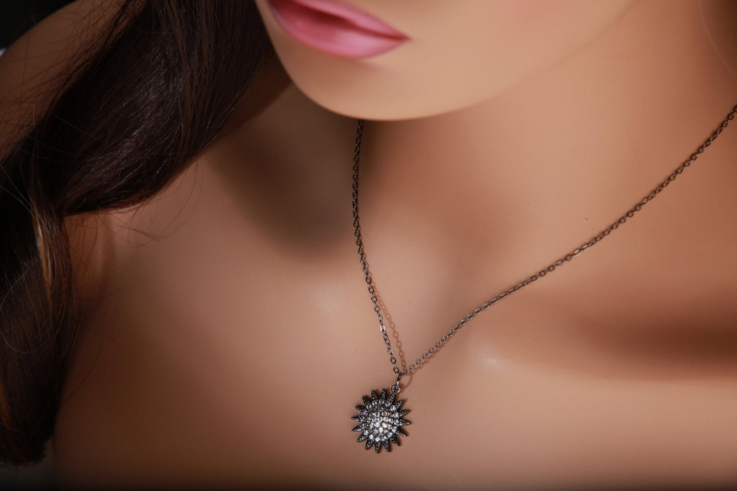 Cubic Zirconia Oxidized and Micro Pave Diamond Sun Charm Necklace. Available in 16",18" and 20"