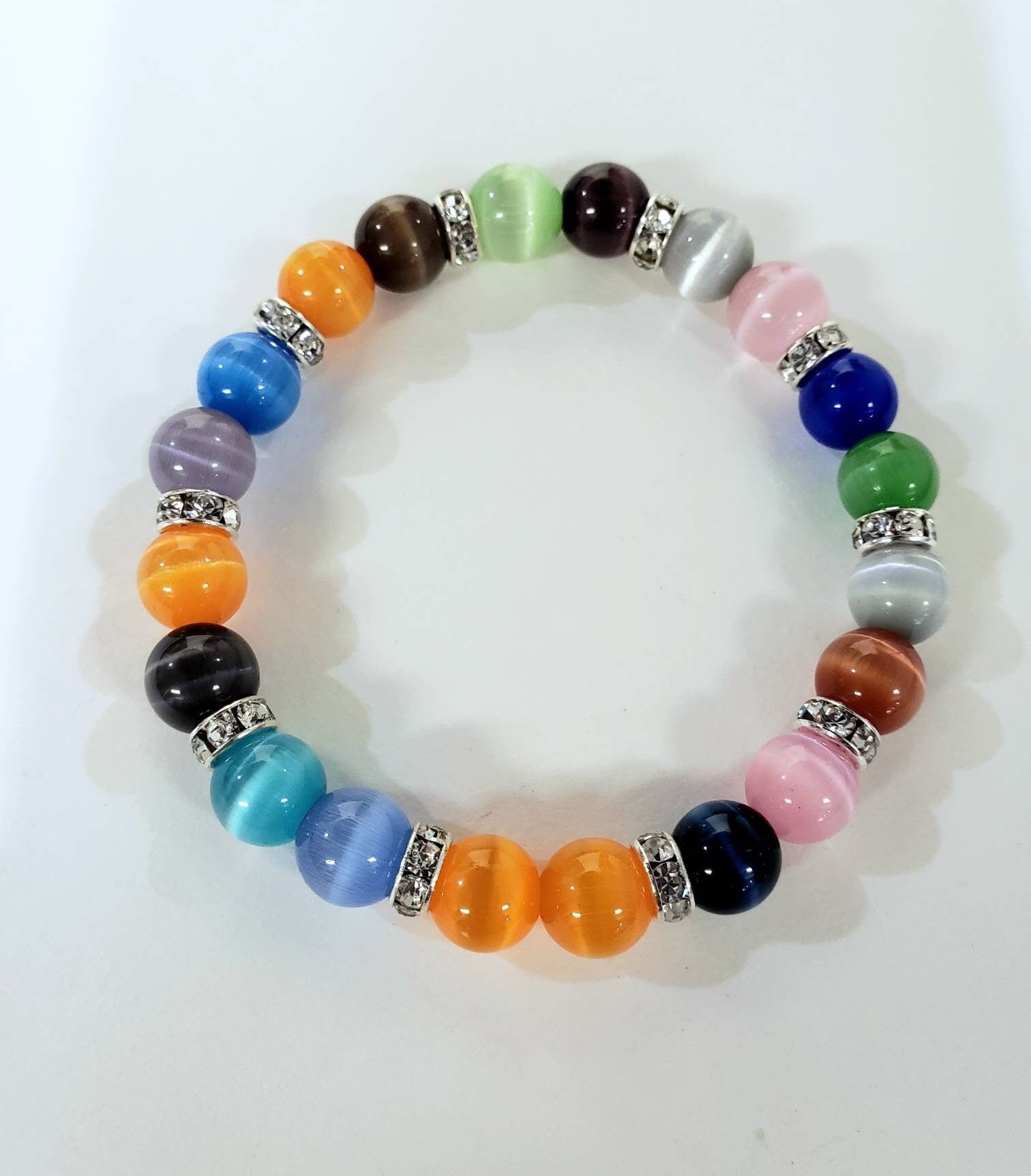 Multi color Cat&#39;s Eye 8mm round stretchy 6&quot; bracelets with rhinestone sparkly roundel. Beautiful summer Beach Boho summer gift for her