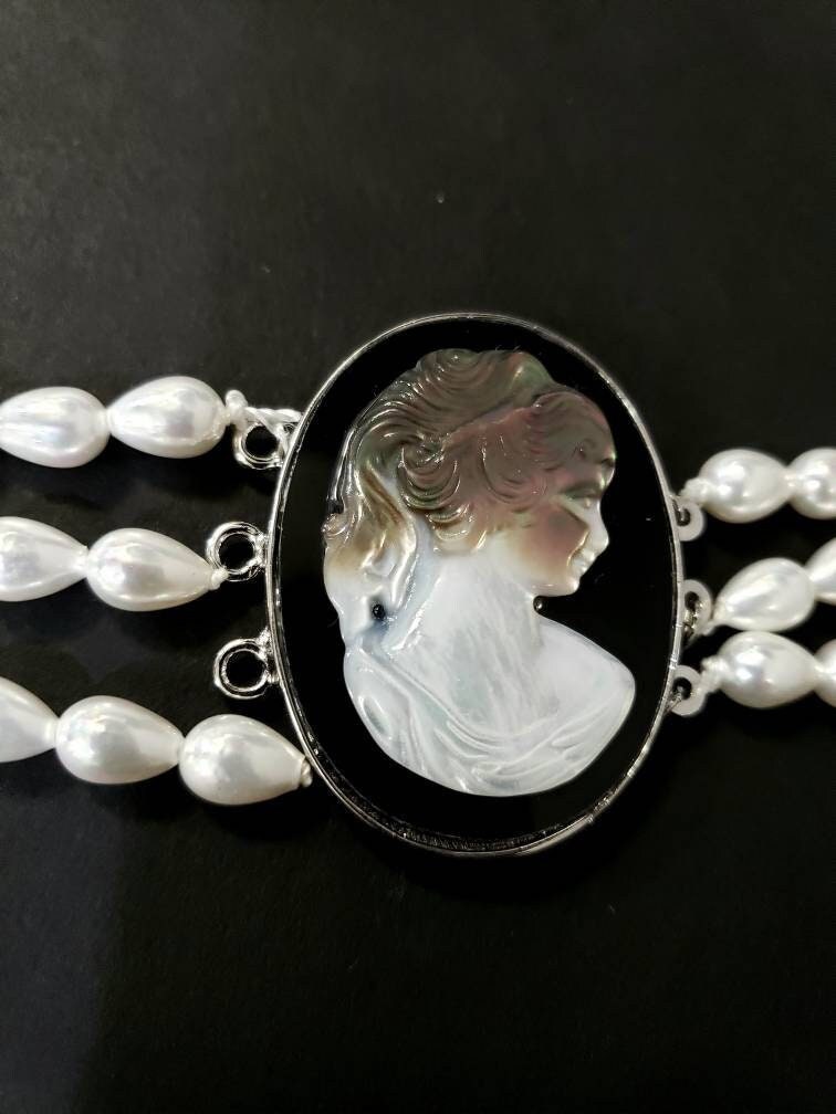 Black lip Mother of Pearl Cameo 3 loop clasp ,39x41Mm large vintage hand curved over Black Onyx surface Rhodium silver clasp .