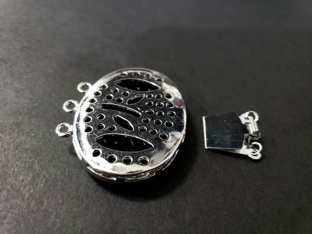 Black lip Mother of Pearl Cameo 3 loop clasp ,39x41Mm large vintage hand curved over Black Onyx surface Rhodium silver clasp .