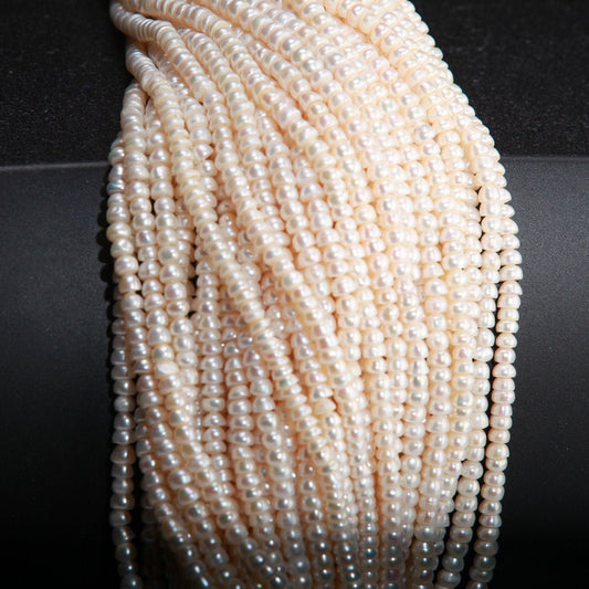 Natural Freshwater Pearl 3x4.5mm Roundel 14” full strand