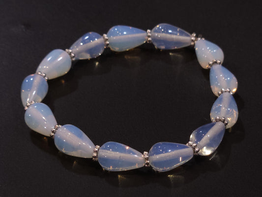 Opalite smooth Teardrop 8x12mm with Bali style Daisy AAA quality beaded Stretchy Bracelet