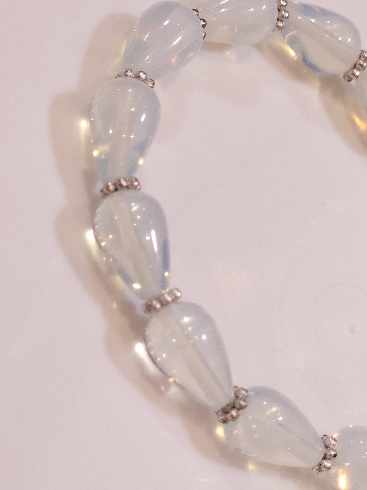 Opalite smooth Teardrop 8x12mm with Bali style Daisy AAA quality beaded Stretchy Bracelet