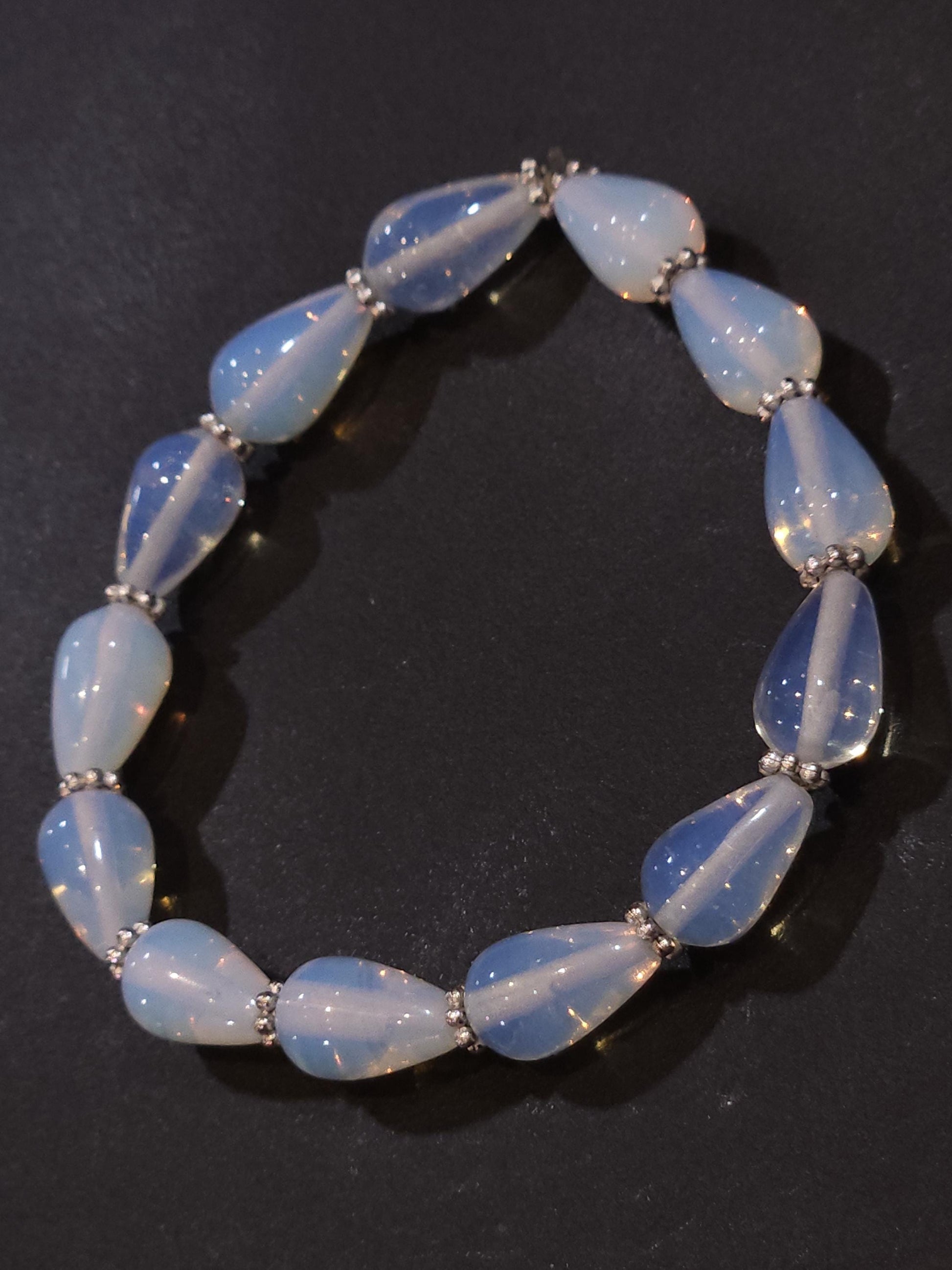 Opalite smooth Teardrop 8x12mm with Bali style Daisy AAA quality beaded Stretchy Bracelet