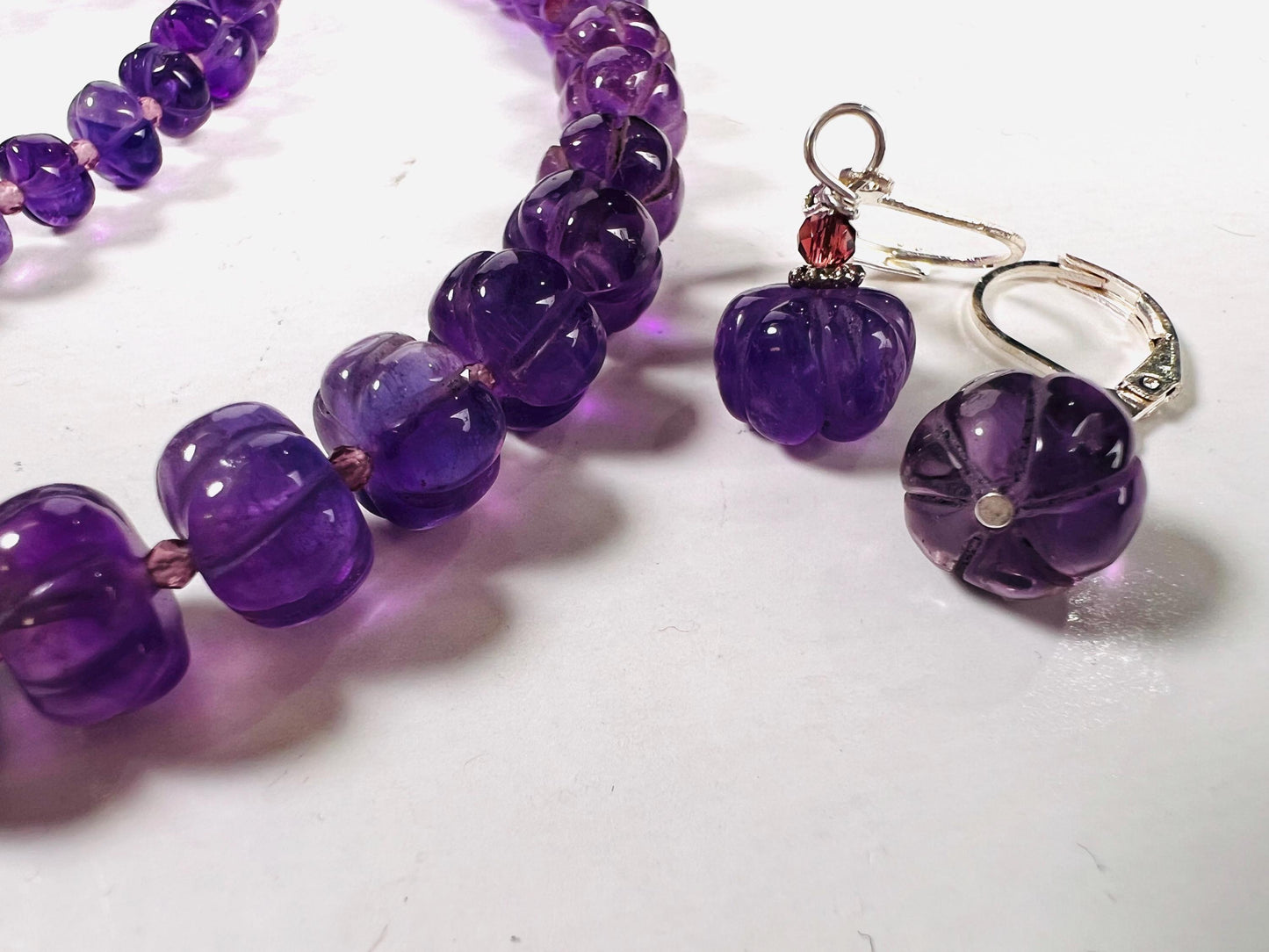 Natural Amethyst Purple 6-8mm AAA Carved Pumpkin Beaded Necklace in Silver Lobster clasp. Necklace and Earrings set. February birthstone