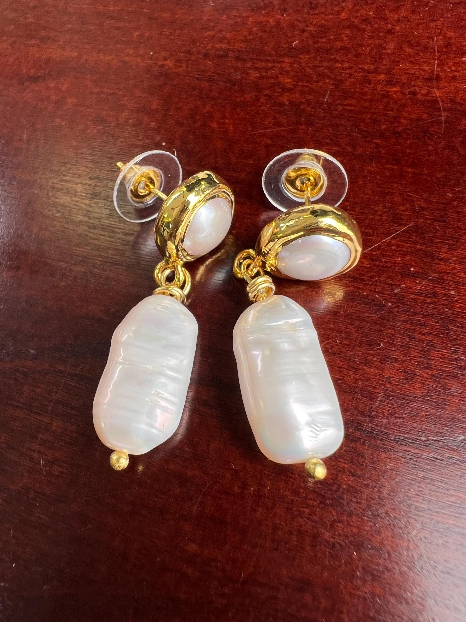 Natural Freshwater Biwa pearl dangling with freshwater Pearl Gold bezel stud earrings.
