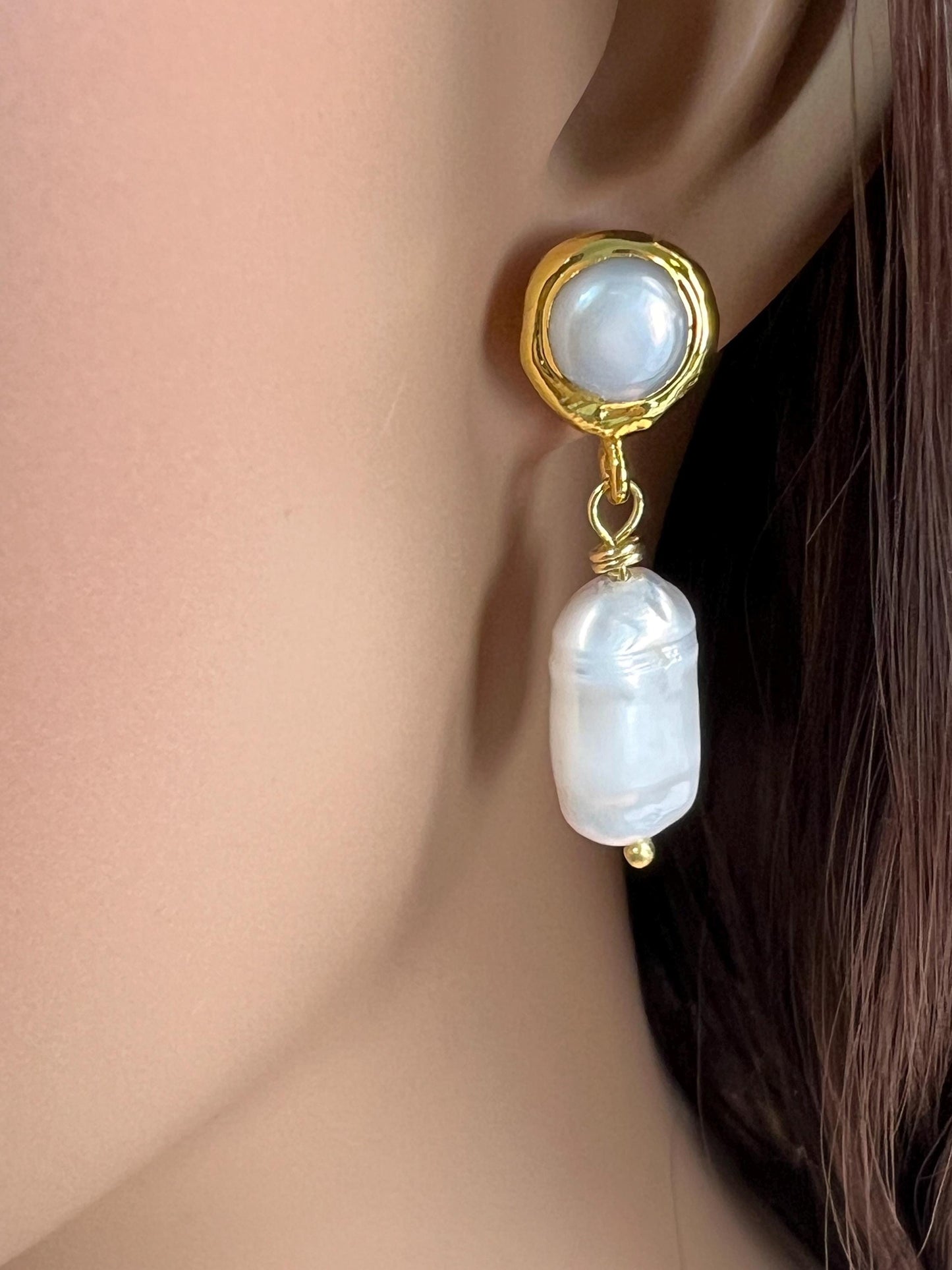 Natural Freshwater Biwa pearl dangling with freshwater Pearl Gold bezel stud earrings.