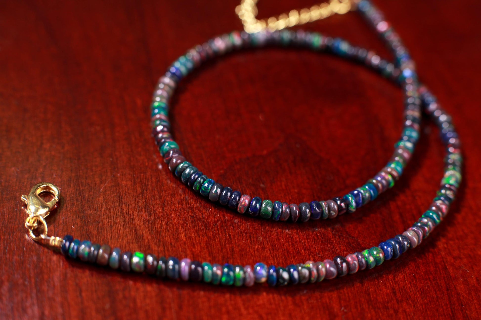 Genuine Ethiopian black Fire Opal, Welo Opal 3.5mm smooth roundel Gold clasp necklace. Elegant gift