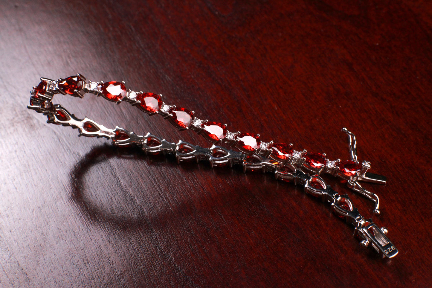 Genuine Garnet Teardrop shape 4x6mm Prong CZ Diamond 925 Sterling Silver Tennis Bracelet 7"with safety clasp. January birthstone, gift