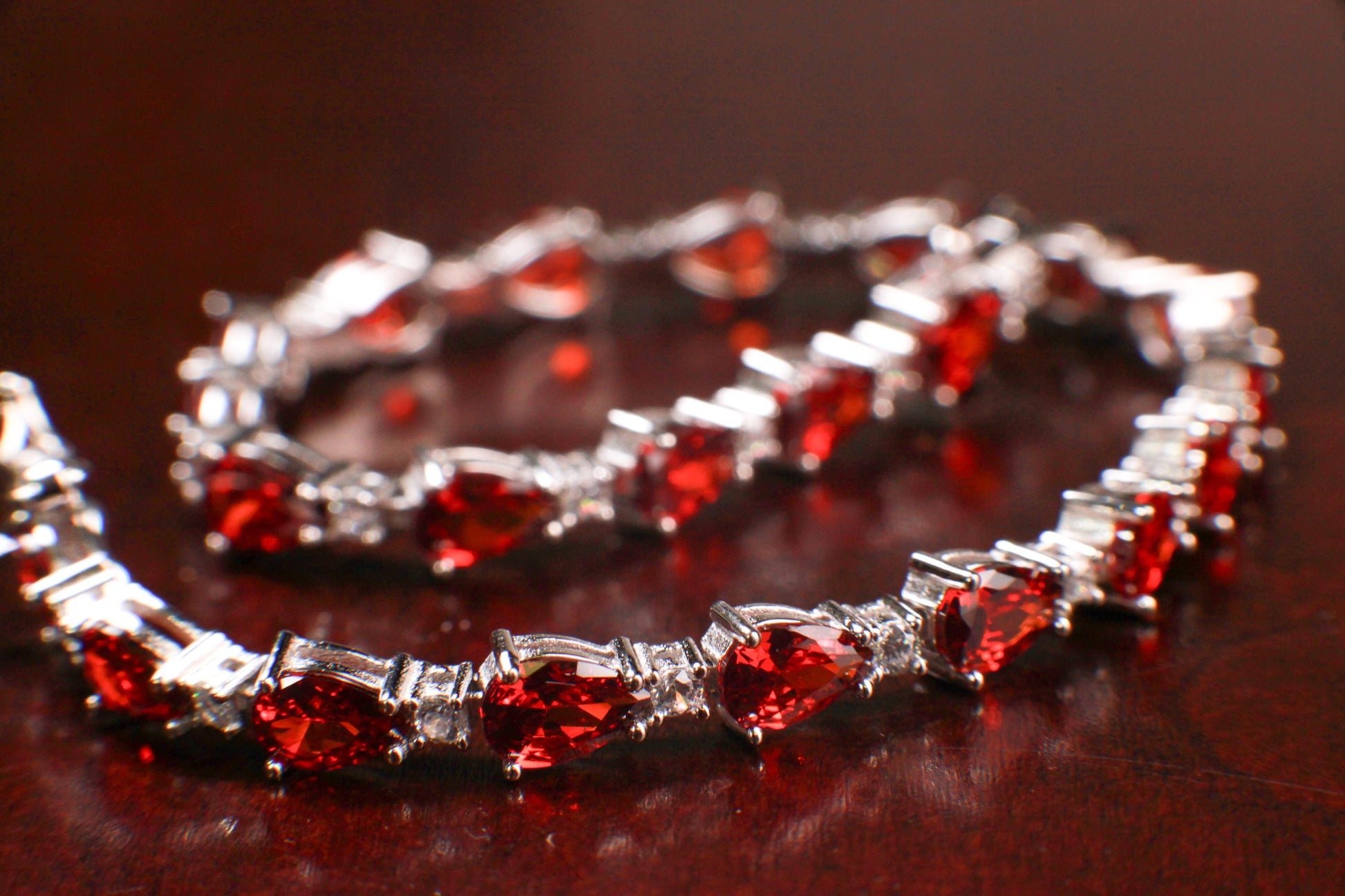 Genuine Garnet Teardrop shape 4x6mm Prong CZ Diamond 925 Sterling Silver Tennis Bracelet 7"with safety clasp. January birthstone, gift