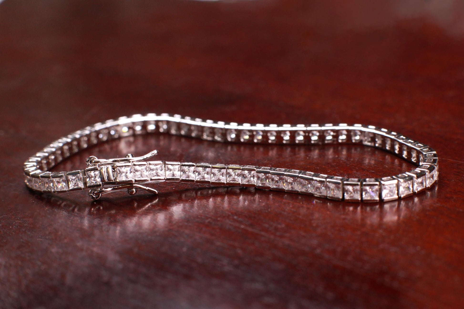 925 Sterling Silver CZ Diamond Princess cut Tennis Bracelet safety lock 7.5” 925 stamped . Elegant party evening wear bridal bracelet