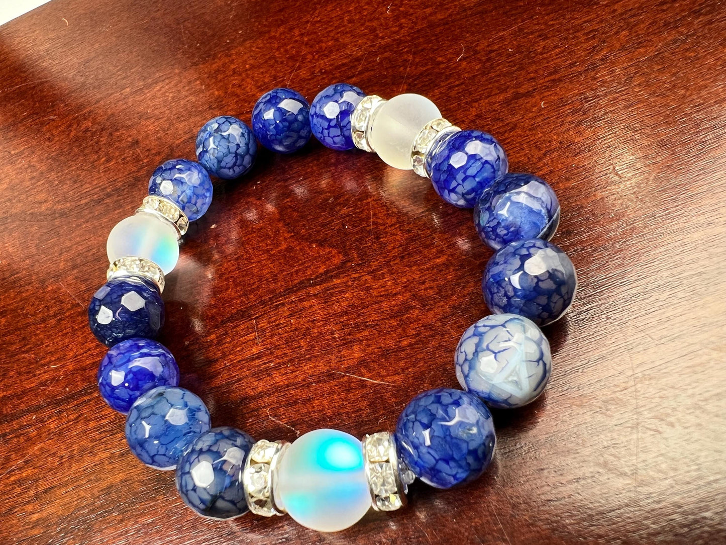 Fire Agate blue faceted 10mm Glass glow bead Rhinestone Spacers stretch Bracelet. Beautiful blue fire agate bracelet gift