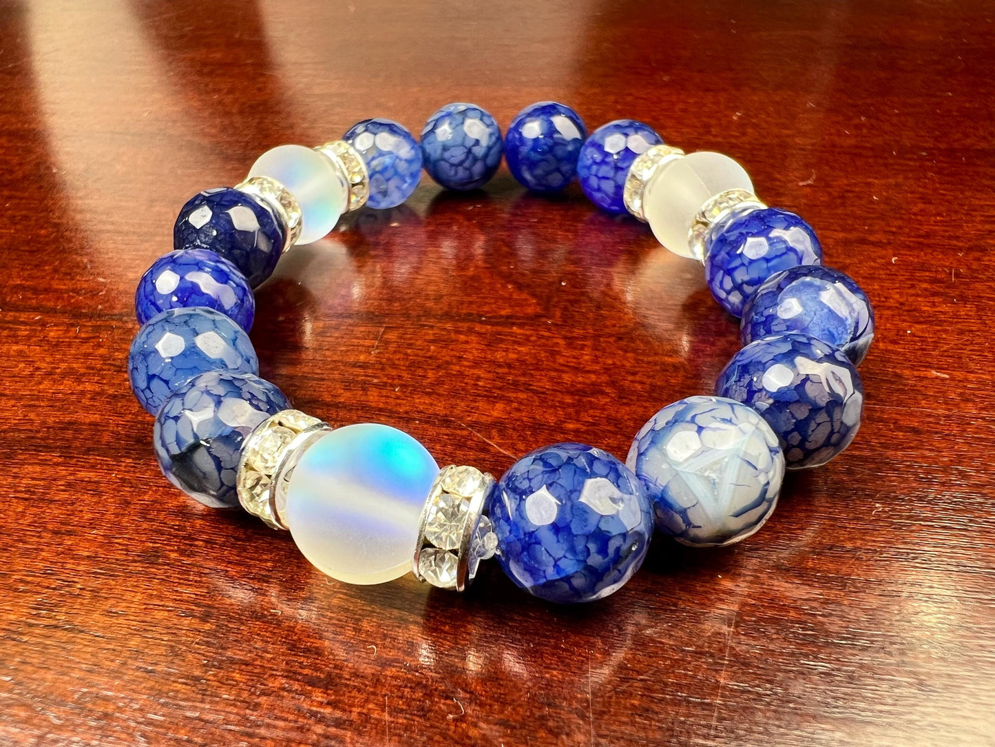 Fire Agate blue faceted 10mm Glass glow bead Rhinestone Spacers stretch Bracelet. Beautiful blue fire agate bracelet gift