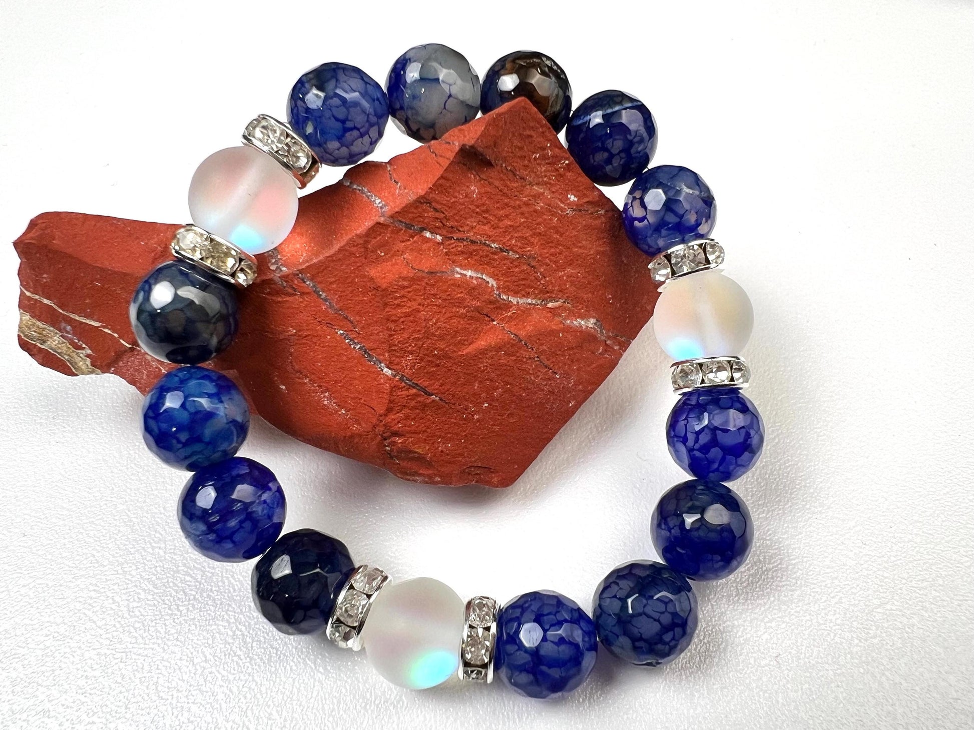 Fire Agate blue faceted 10mm Glass glow bead Rhinestone Spacers stretch Bracelet. Beautiful blue fire agate bracelet gift