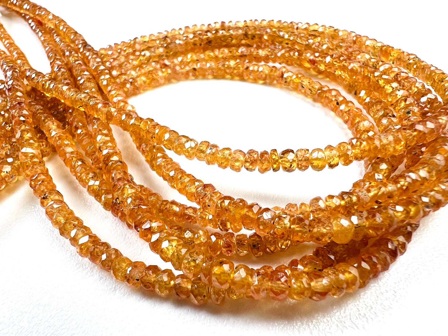 Natural Orange Sapphire Songea Sapphire 3.5mm Faceted roundel 7",14" strand jewelry making spectacular beads. Rare gemstone 14" st 50 cts