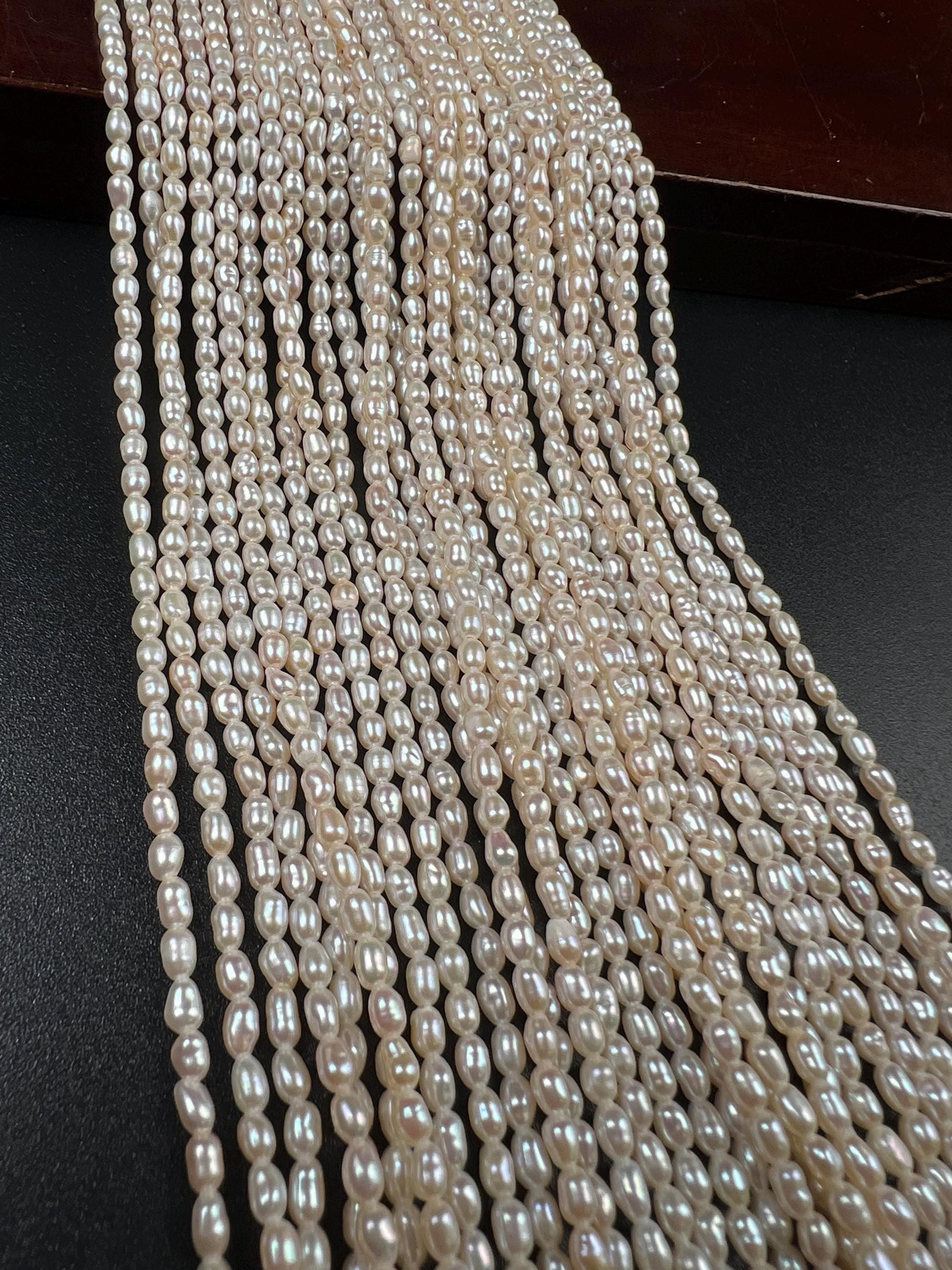 Natural Freshwater pearl Ivory white Rice oval AAA quality pearl cream color 3-4mm tiny pearl 14” full strand