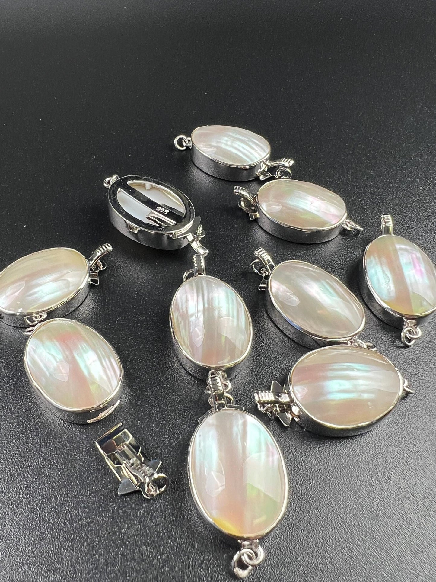 White Mother of Pearl Oval large vintage hand curved push in open Fancy Rhodium Sterling silver clasp.