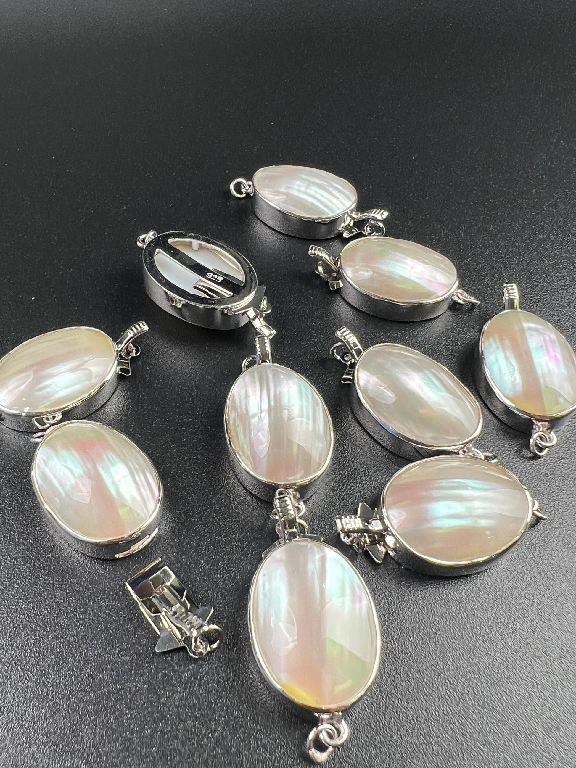 White Mother of Pearl Oval large vintage hand curved push in open Fancy Rhodium Sterling silver clasp.