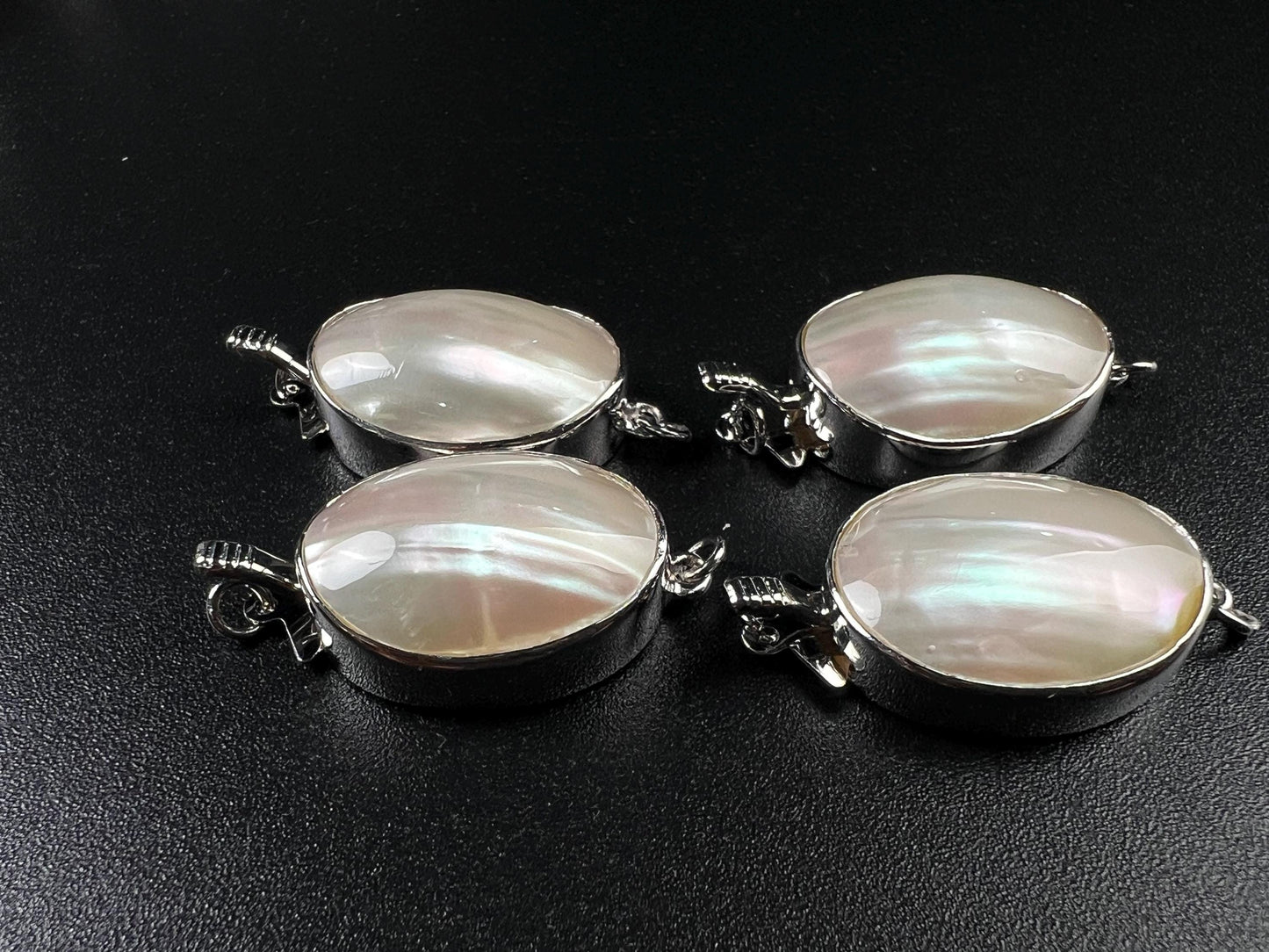 White Mother of Pearl Oval large vintage hand curved push in open Fancy Rhodium Sterling silver clasp.