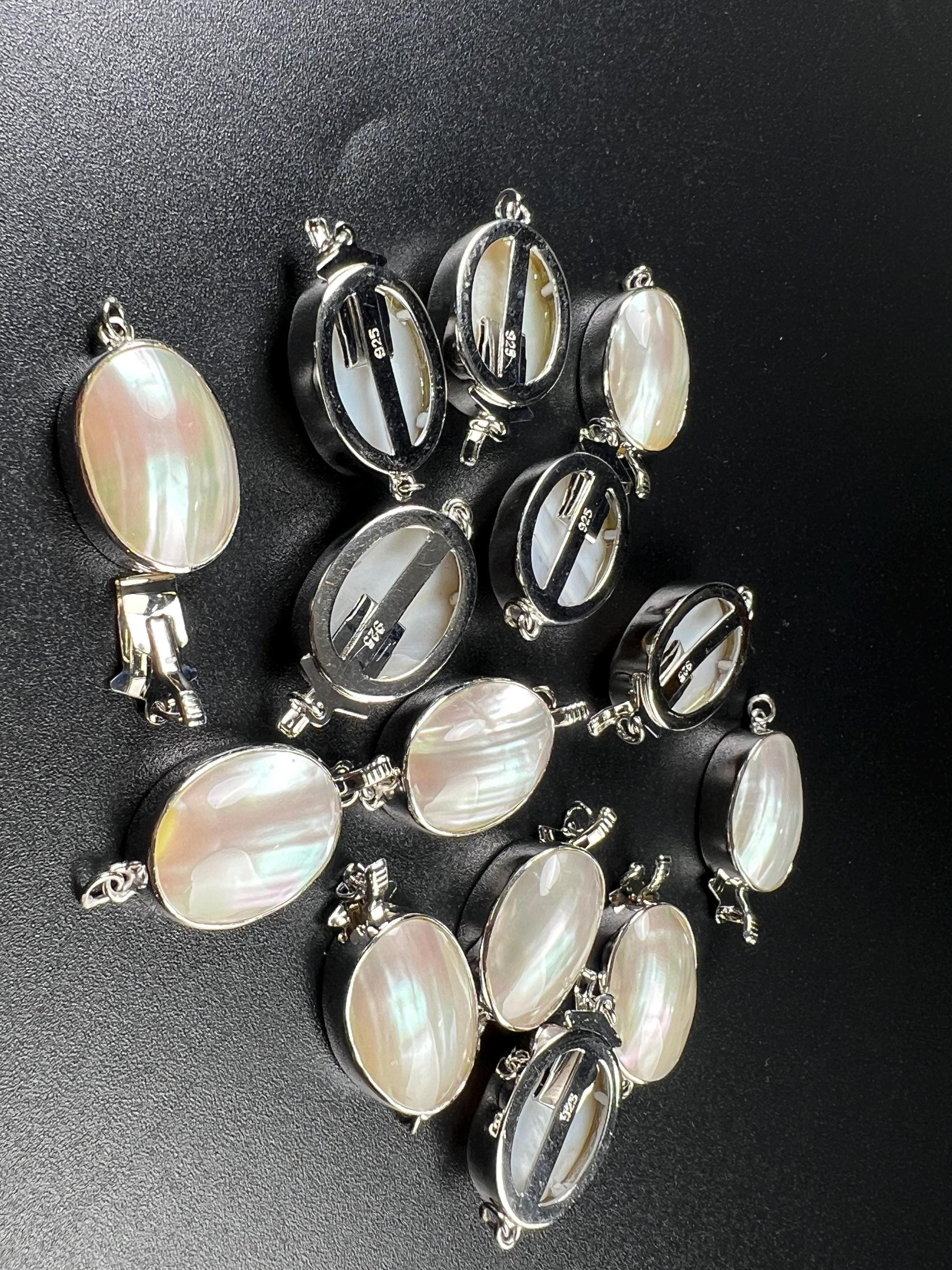 White Mother of Pearl Oval large vintage hand curved push in open Fancy Rhodium Sterling silver clasp.