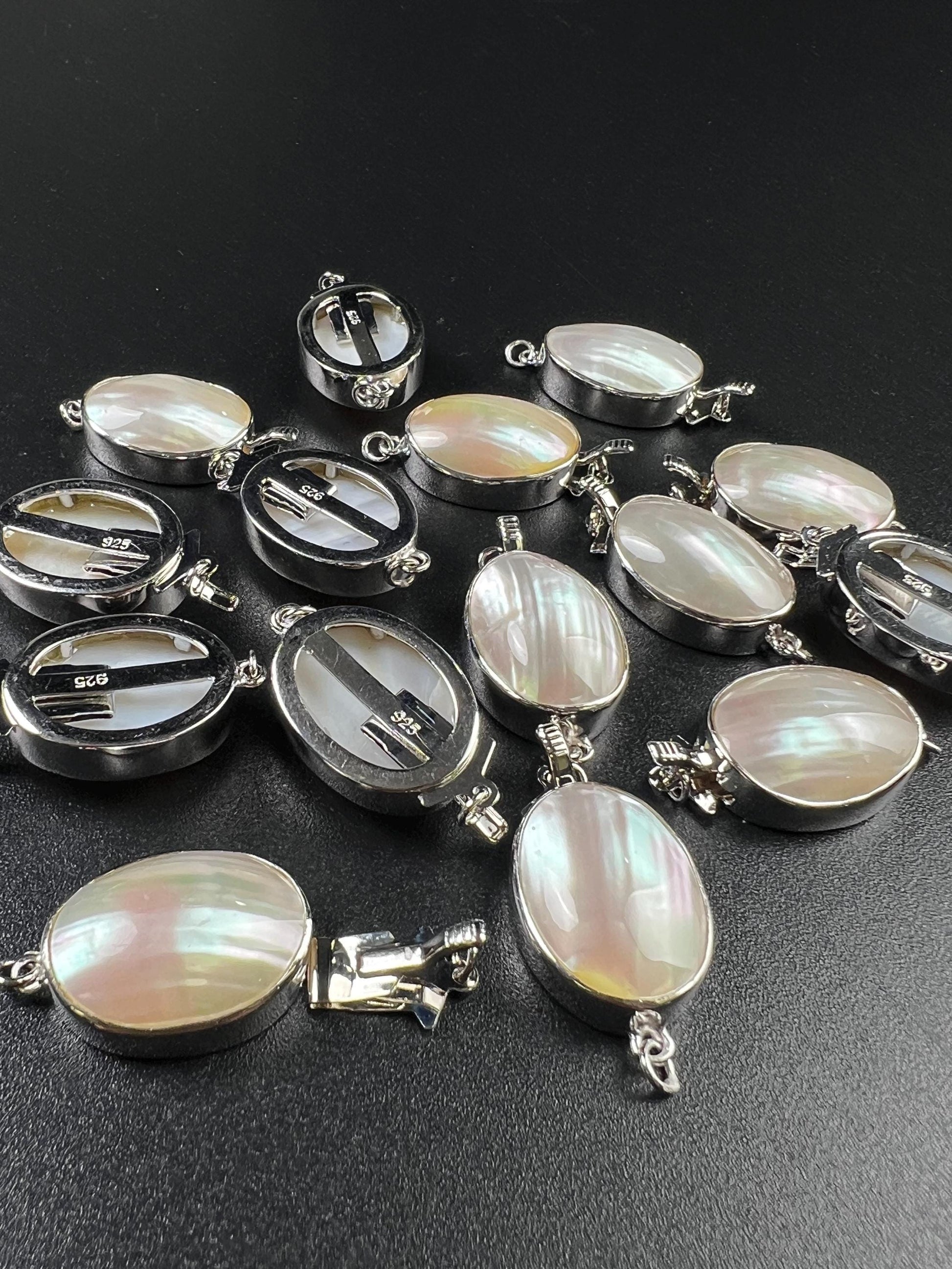 White Mother of Pearl Oval large vintage hand curved push in open Fancy Rhodium Sterling silver clasp.