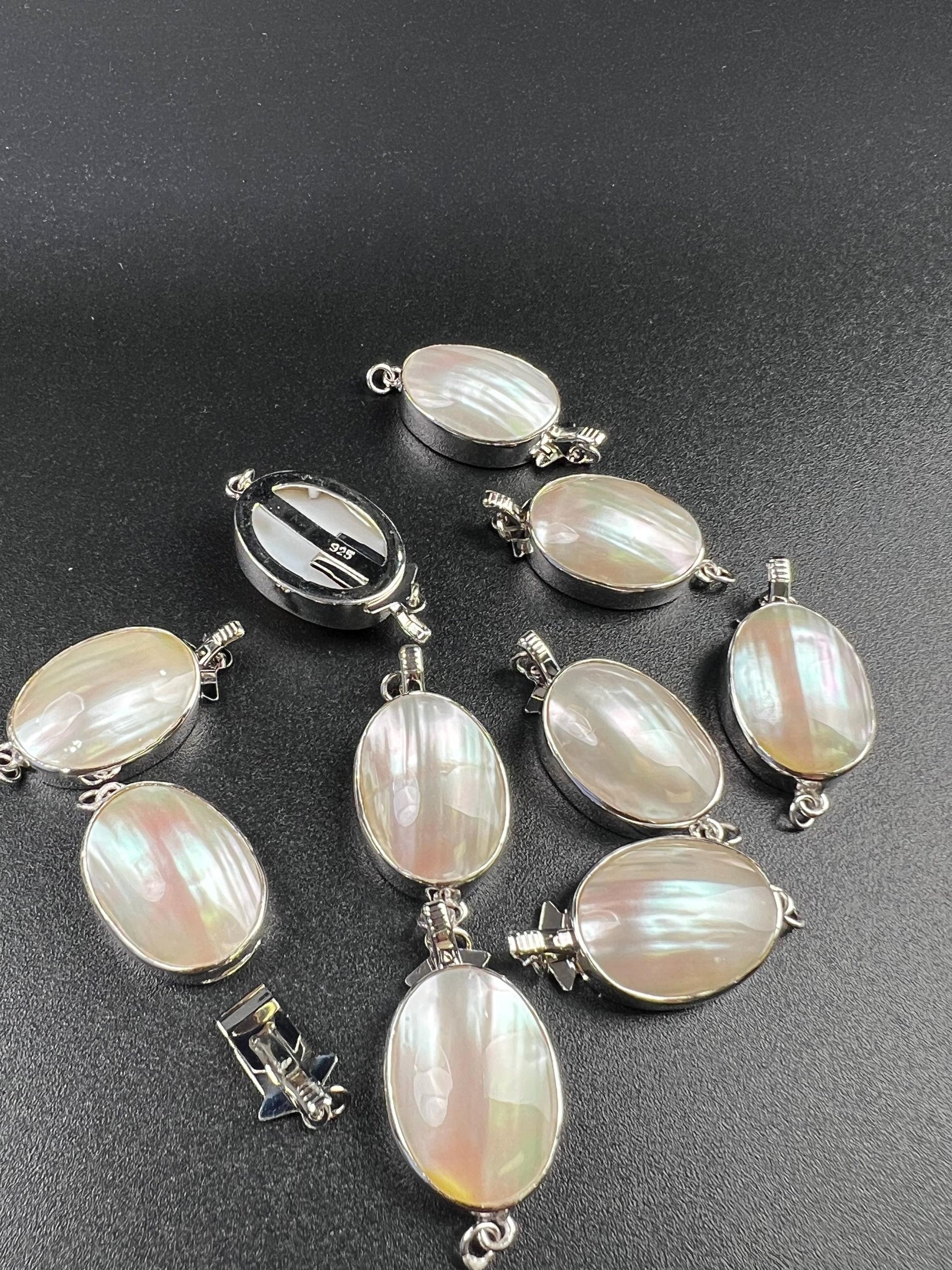 White Mother of Pearl Oval large vintage hand curved push in open Fancy Rhodium Sterling silver clasp.