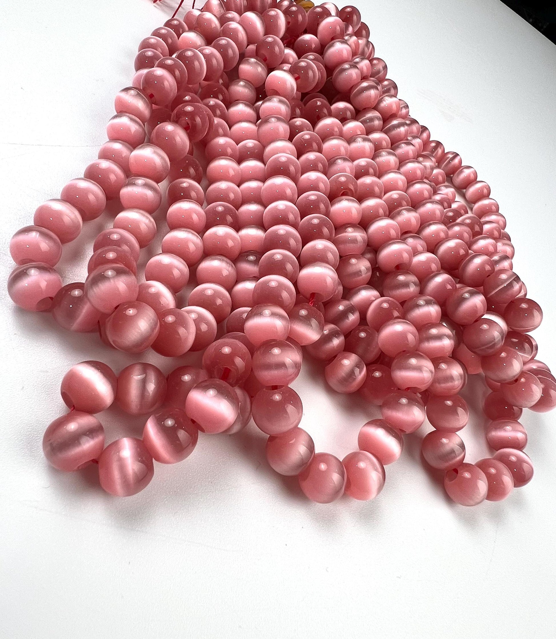 Pink Cat’s Eye 10mm smooth round large hole beads 14” strand 38 pcs